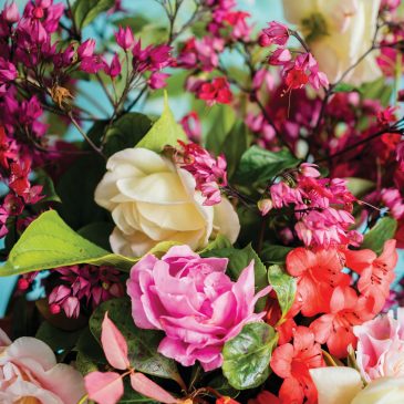 Bloemen voor de 100e deelnemer